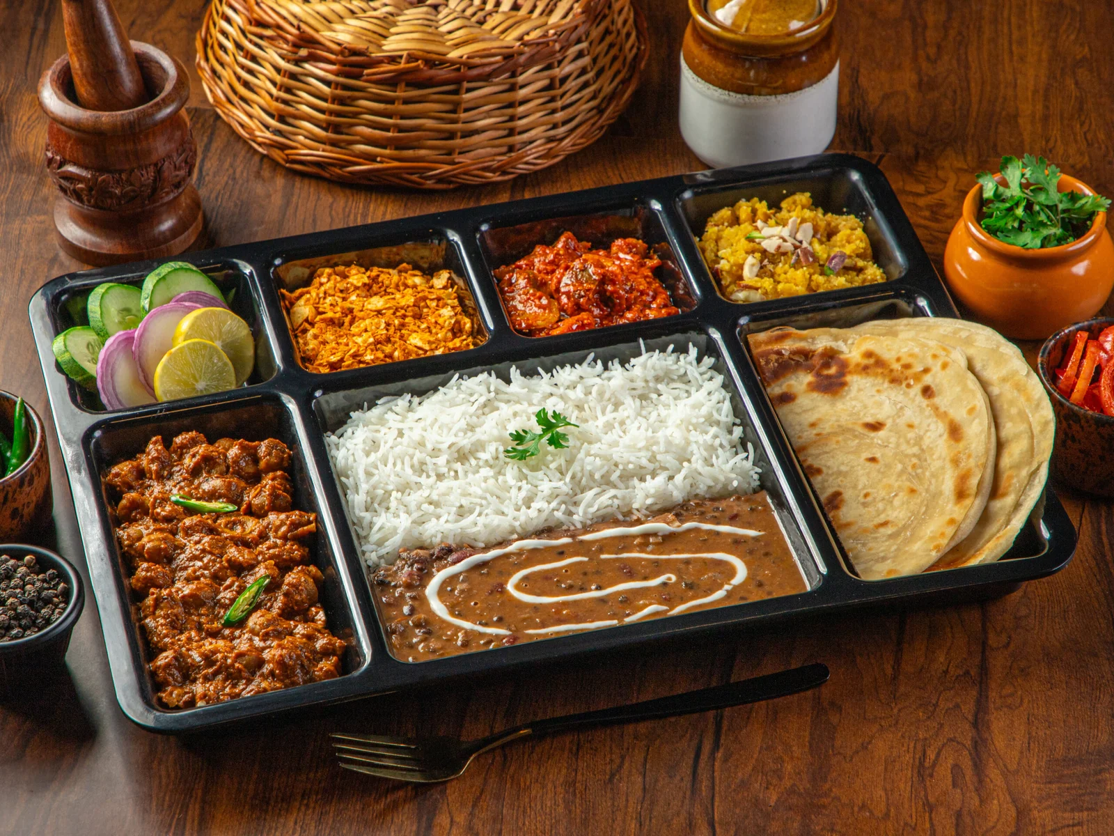Indian meal with dal makhani salad and dessert by Pumpkin Yatri Meals