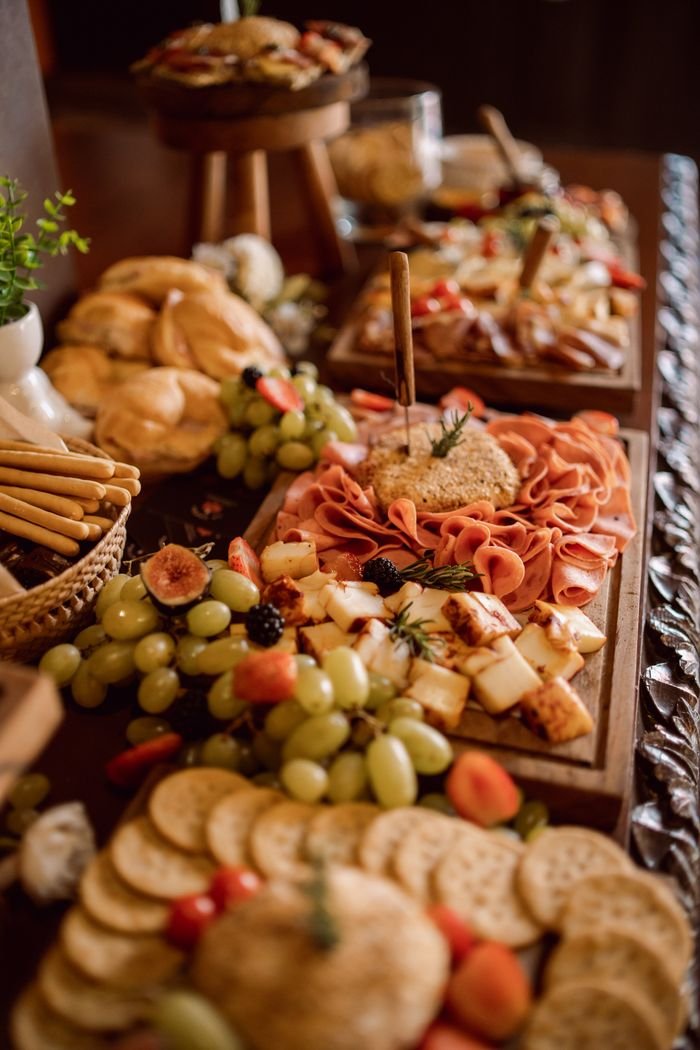The Art of Drawing Readers In: Your attractive post title goes here Elegant charcuterie board with cheese, fruit, and meats, perfect for weddings.